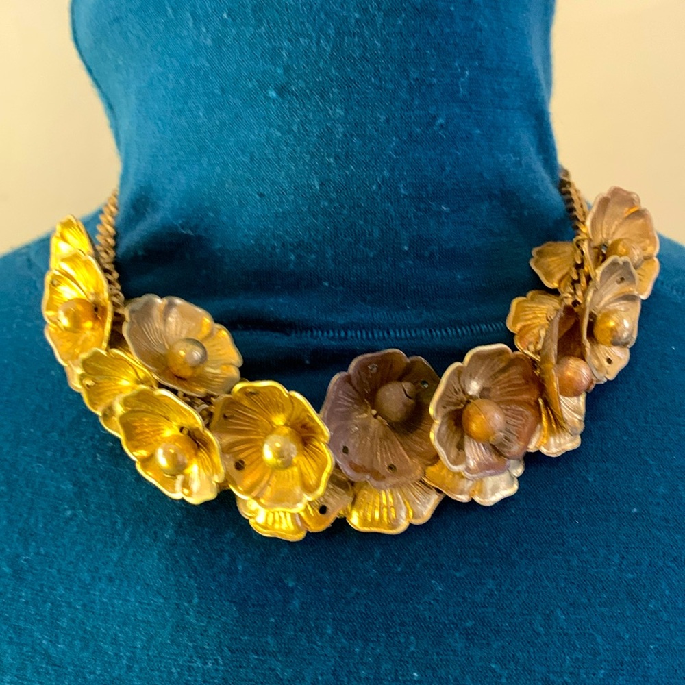 Lovely vintage brass floral necklace with linked chain.